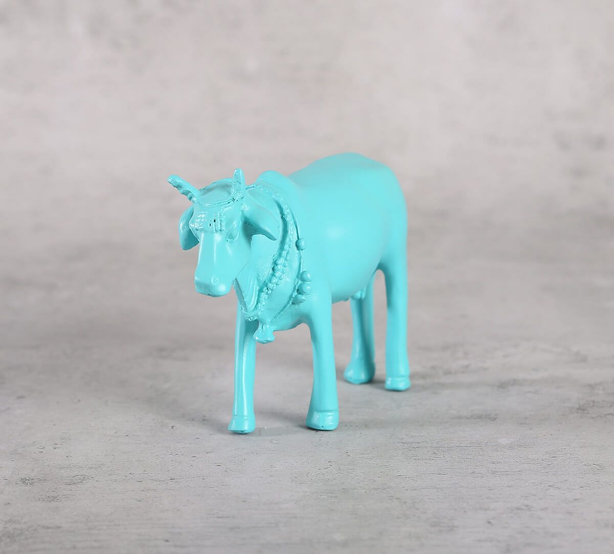 India Circus Cerulean Cow Figurine