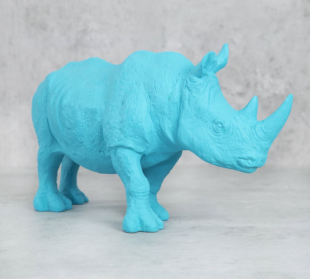 India Circus Sky Blue Rhino Calf Figurine